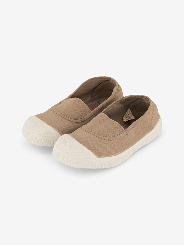 les enfants élastiques de tennis shell