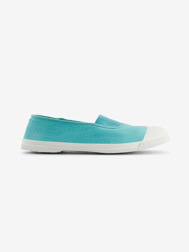 les femmes élastiques de tennis turquoise