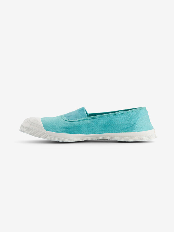 les femmes élastiques de tennis turquoise